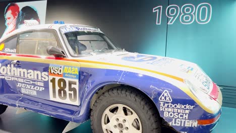 exhibition of retro racing cars of the porsche com 2023 11 27 05 16 16 utc.mov | automobile, automotive, background, building
