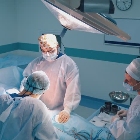 surgical operation abdominoplasty. surgical removal of fat tissue from the abdomen