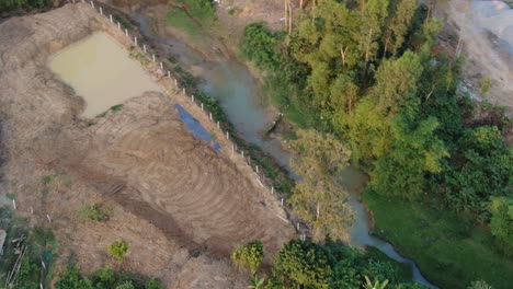 Top-rotating-view-of-puddle-muddy-ground