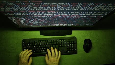 person coding at night