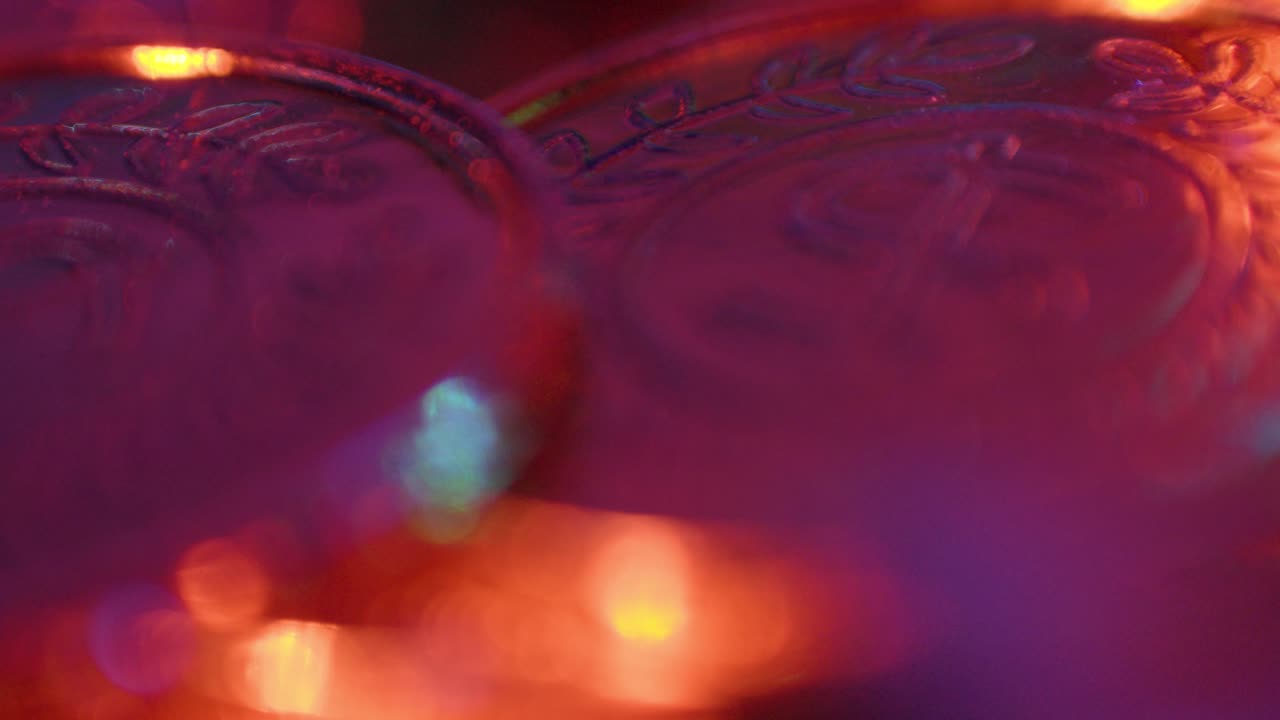 close-up shot of multiple bitcoins coins falling ontop of each other