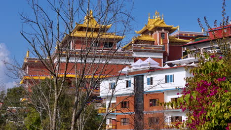 colorful environment namobuddha monastery in dhuklikhel nepal, peaceful sunny weather vibrant nature building 4k