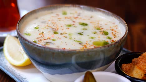 turkish creamy soup with lemon and toasts