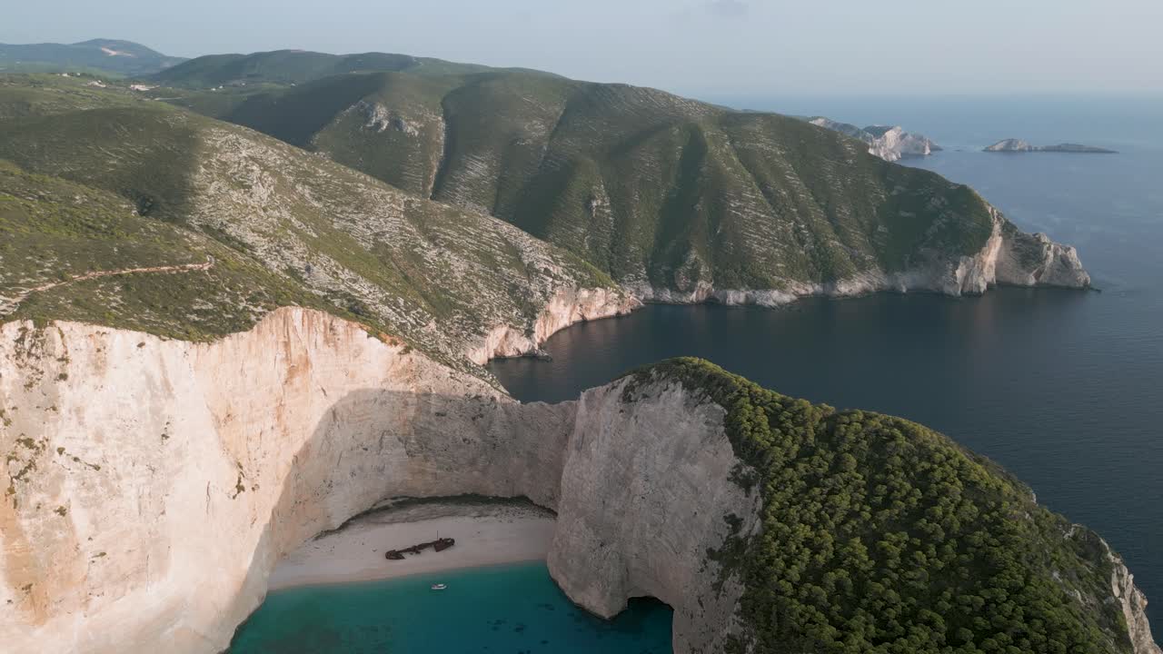 Shipwreck Beach in Zante, Greece, featuring towering cliffs and turquoise waters