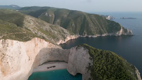 shipwreck beach in zante, greece, featuring towering cliffs and turquoise waters