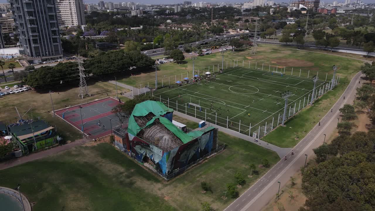 Football match in a sports park, aerial view