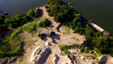 sand extraction plant near river. aerial view travelling