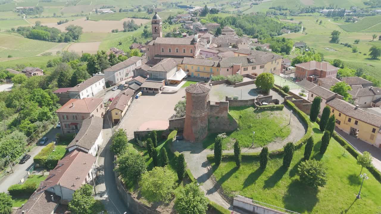 Castelnuovo Calcea, Monferrato region, Asti, Piedmont, Italy. 4k aerial view of the city. Langhe-Roero and Monferrato. Circling aroud the castle and the city.