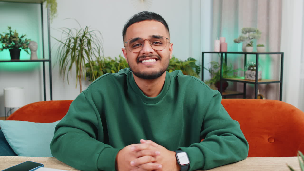 Happy indian man smiling friendly glad expression feel satisfied concept good news celebrate win