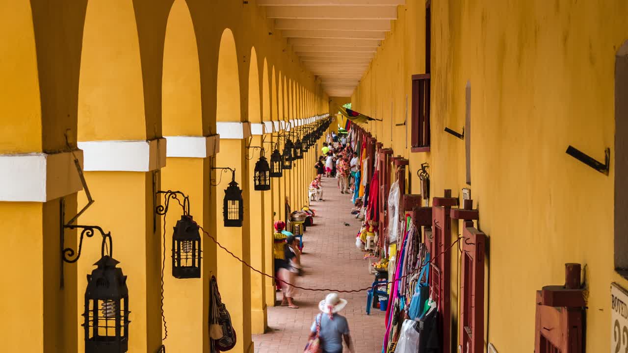 Time Lapse View of Tourists Shopping at the Historic Las Bovedas Market in the Old City of Cartagena, Colombia