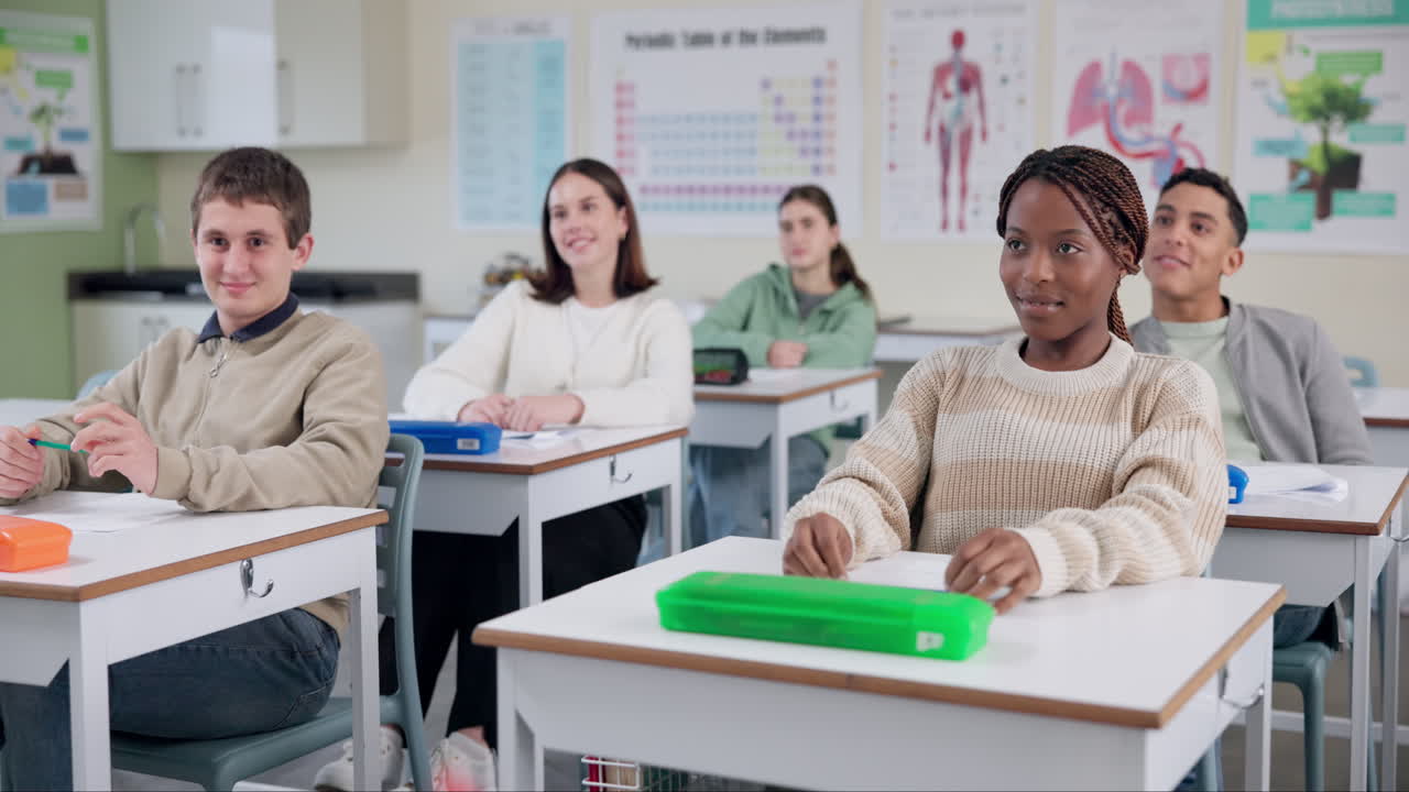 Students laughing in a classroom setting