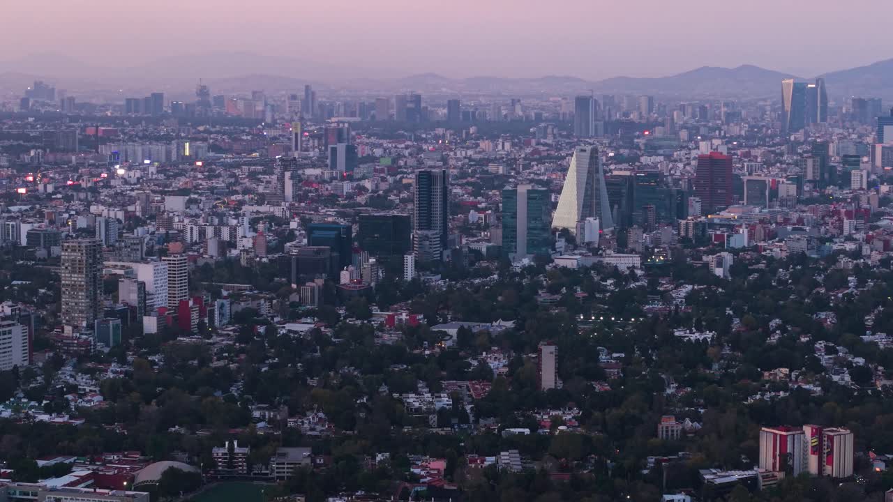 Aerial view featuring purple evening light over Mexico City