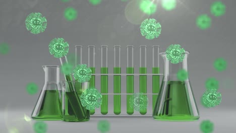 Animation-of-green-covid-19-cells-over-flasks-and-test-tubes