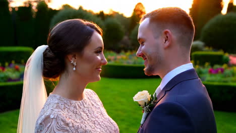 couple's portrait at sunset wedding