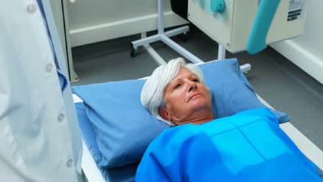 senior woman undergoing an x-ray test