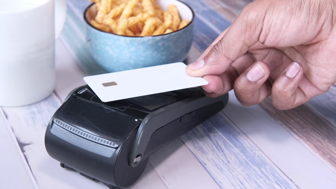 Paying with Credit Card at a Cafe