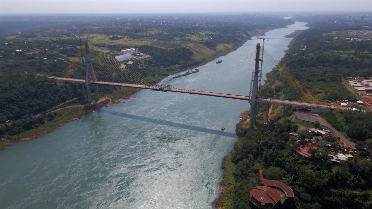 Integration Brazil Paraguay border bridge under construction infrastructure, aerial drone