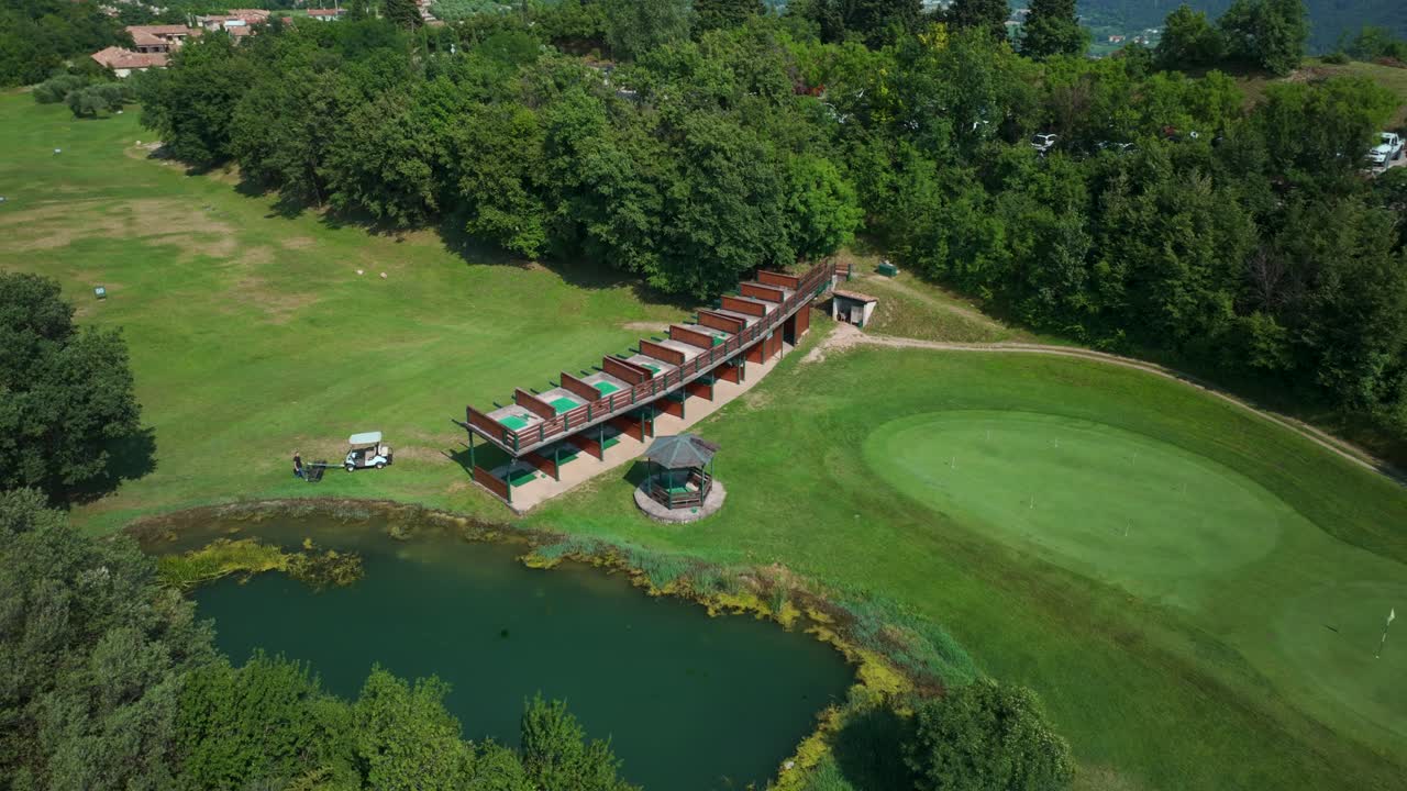 Aerial View Driving Ranges At Ca' degli Ulivi' Golf Club beside Lake