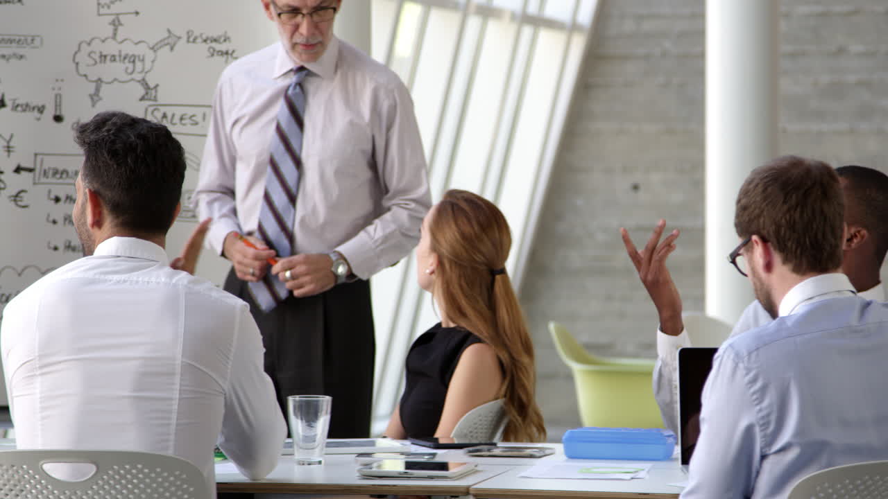 Businessman Leads Brainstorming Session Shot On R3D