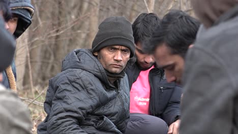 pakistani migrants gather in a field along the serbian border with croatia. sombor, serbia, 02-08-18