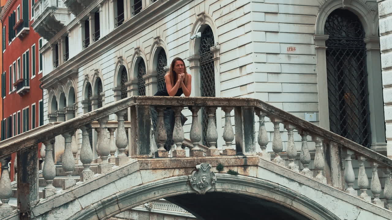 Woman enjoying view from Ponte del Forner in Venice, Italy