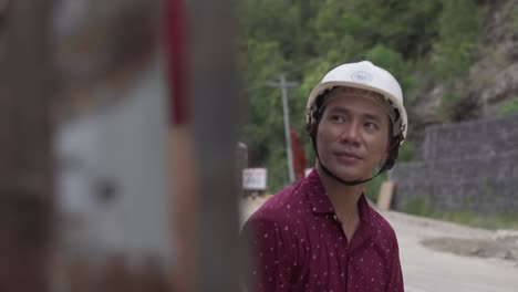 Good-Looking-Filipino-Engineer-Wearing-Safety-Helmet-Staring-At-His-Beautiful-Filipina-Girlfriend-In-The-Philippines