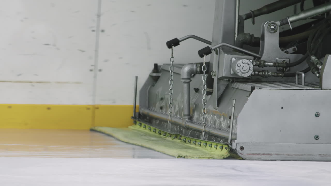 Ice Resurfacer Cleaning Indoor Ice Rink