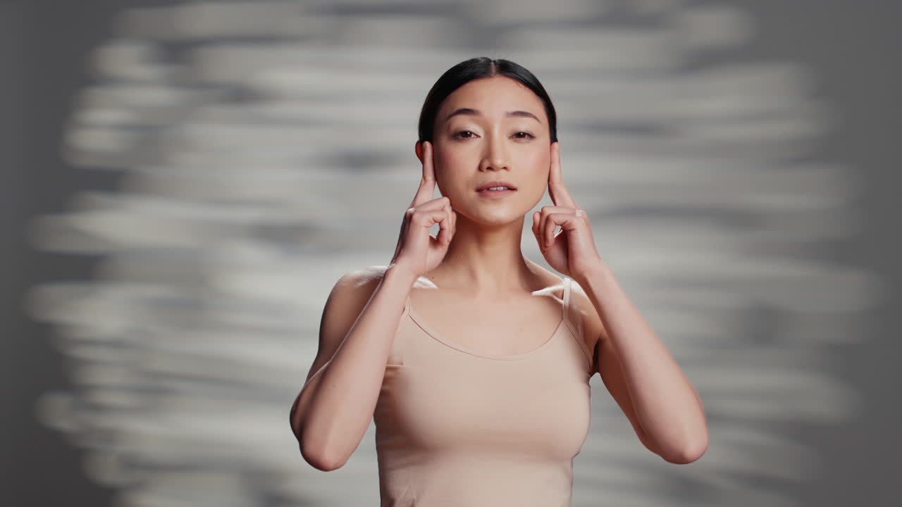 Woman doing face massage