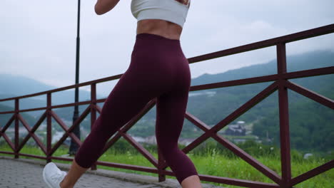 woman exercising outdoors in the mountains