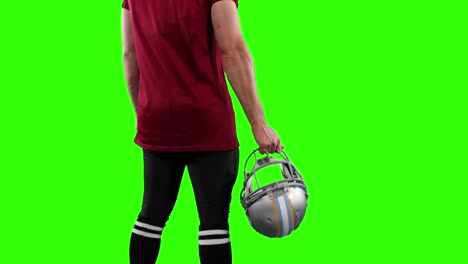 american football player on green screen background.