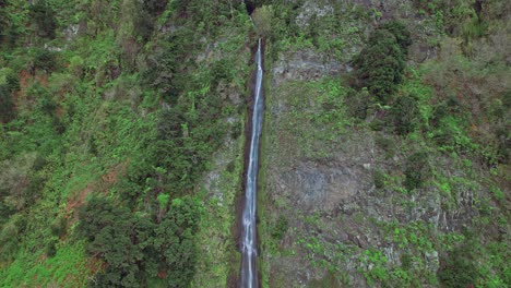 isolated waterfall cascade at madeira island, portugal