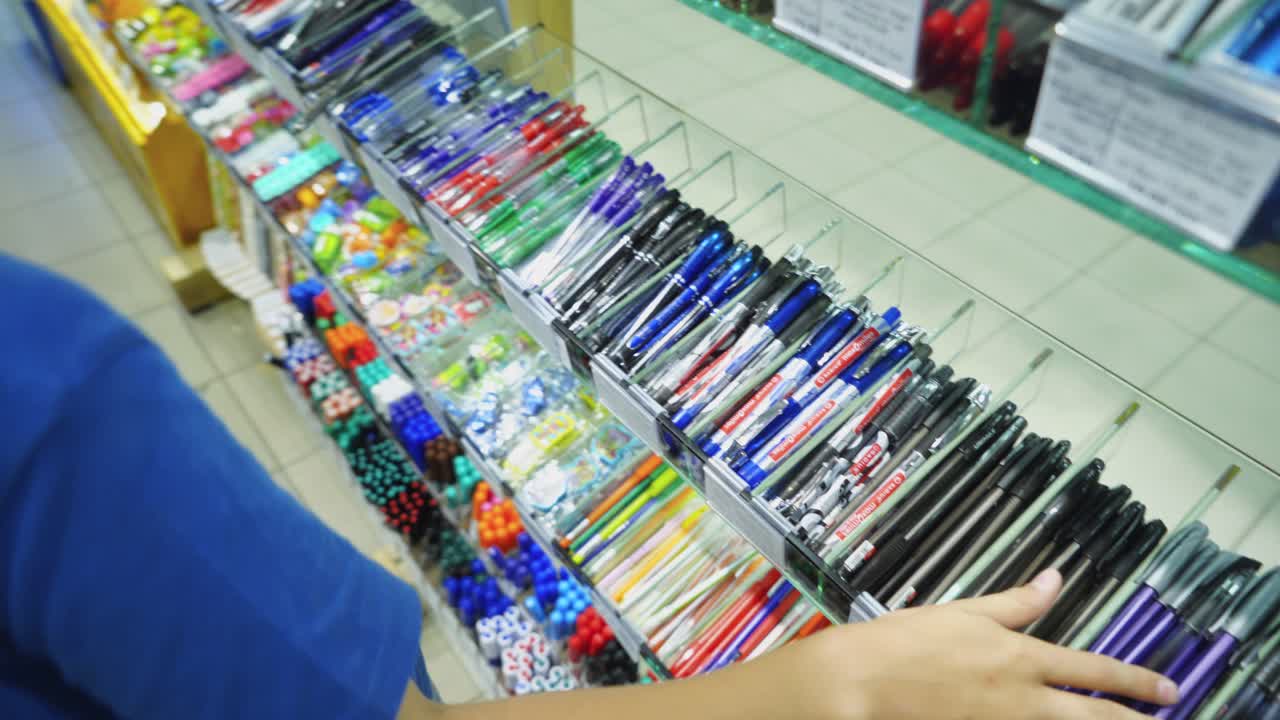 Vinnitsa, Ukraine - August 20, 2018: Back to school concept. Purchase of stationery in the store. Close-up.