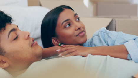 Couple,-living-room-and-moving-with-conversation