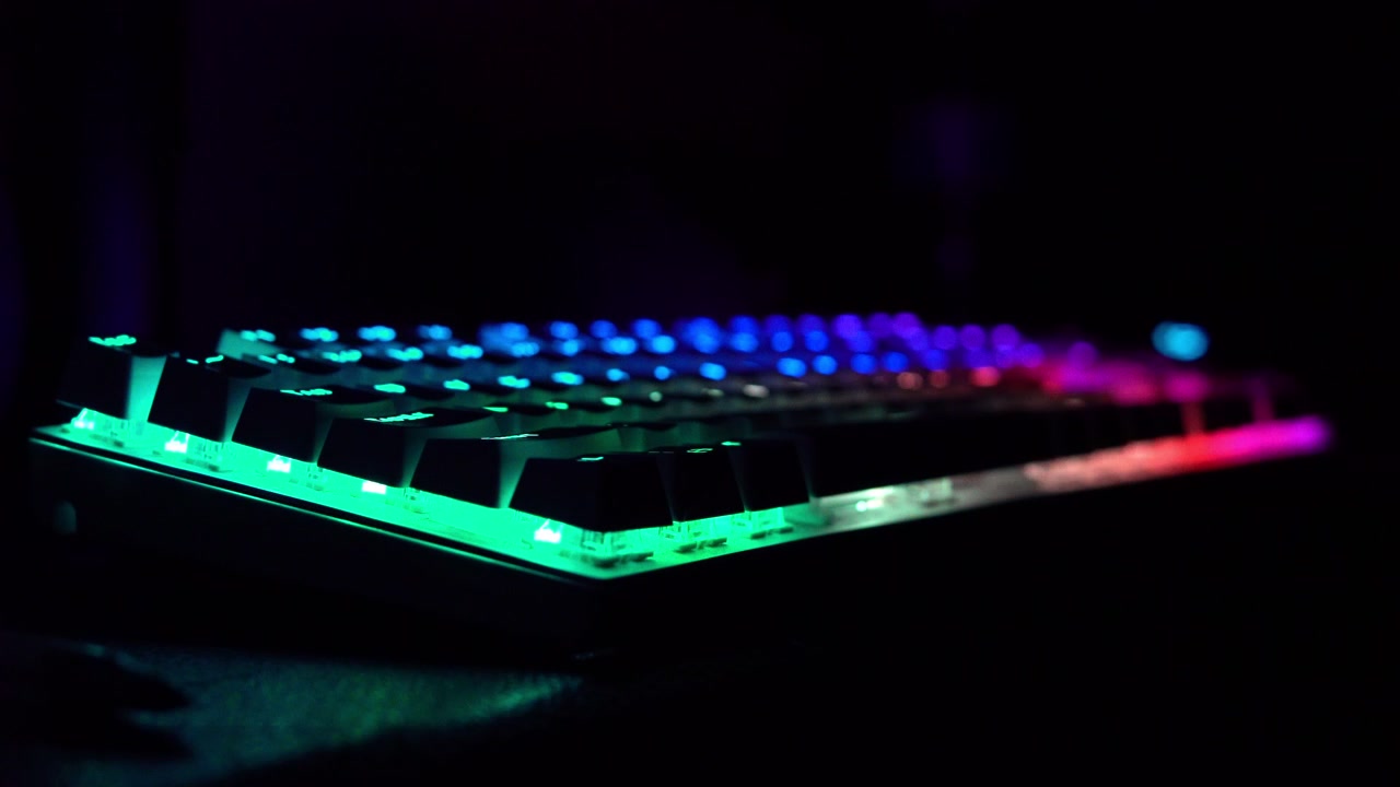 Mechanical Gaming RGB Keyboard lights up in the dark shot in 4k