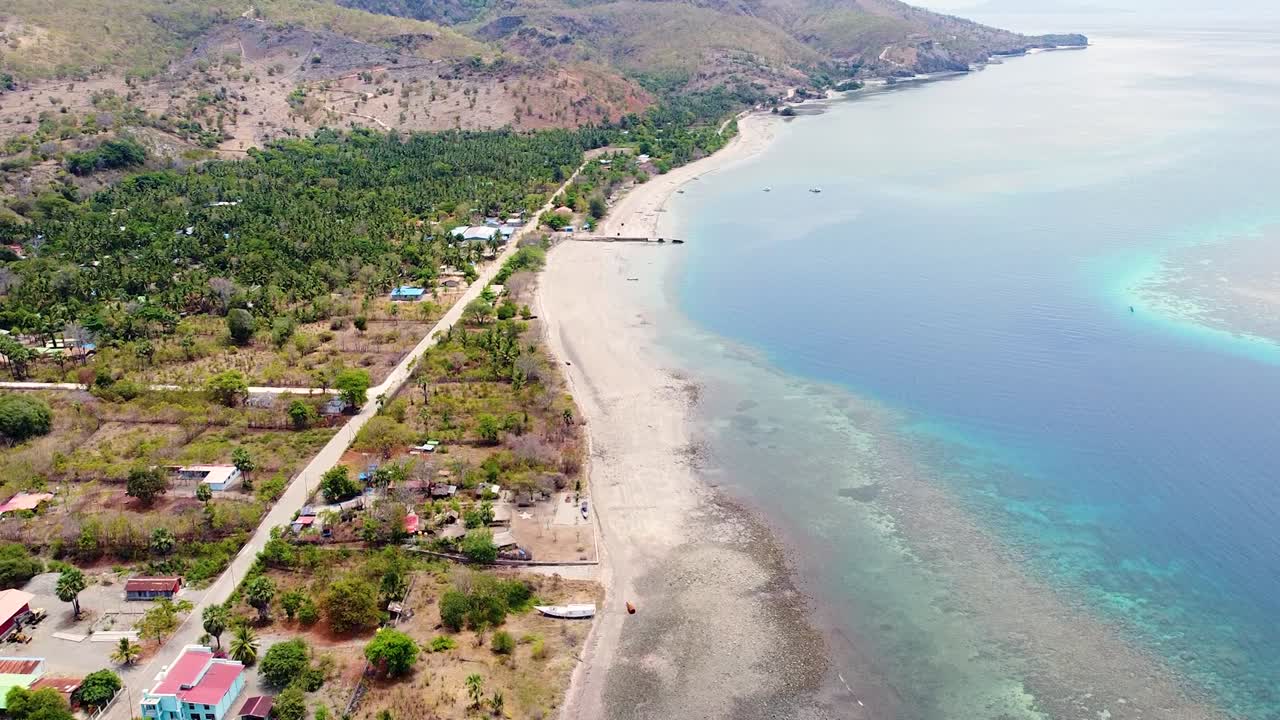 Rising aerial drone view of remote tropical Atauro