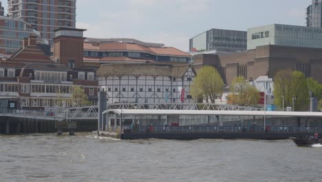 View-From-Boat-On-River-Thames-Showing-Globe-Theatre-And-Tate-Modern-Buildings-On-London-Skyline