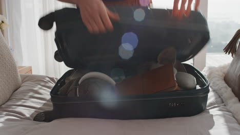 travel woman packing suitcase getting ready for road trip preparing luggage for vacation