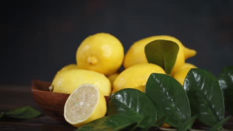 ripe lemons with leaves slowly rotate.