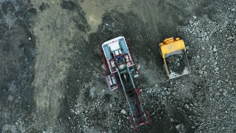 aerial view of mining equipment in quarry