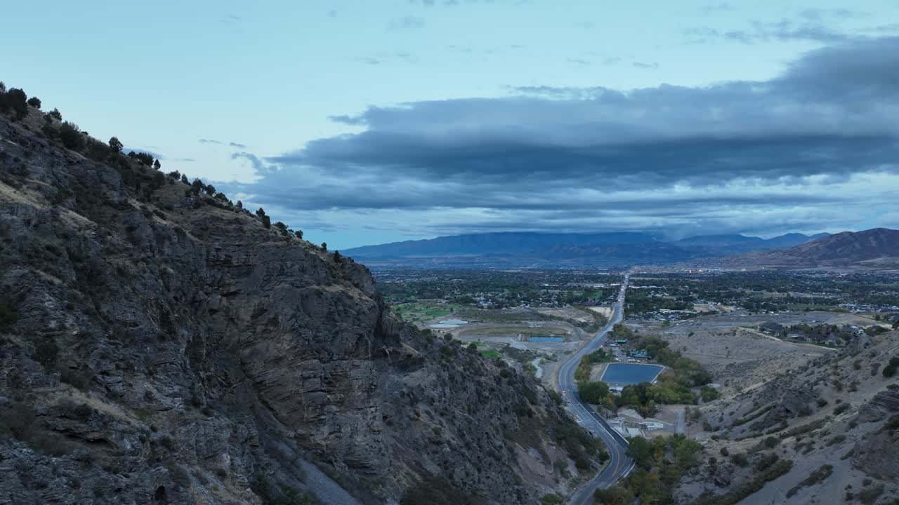 Aerial Flyover Of Spanish Fork Canyon Landscape At Dawn Revealing Homes In Utah Valley, USA
