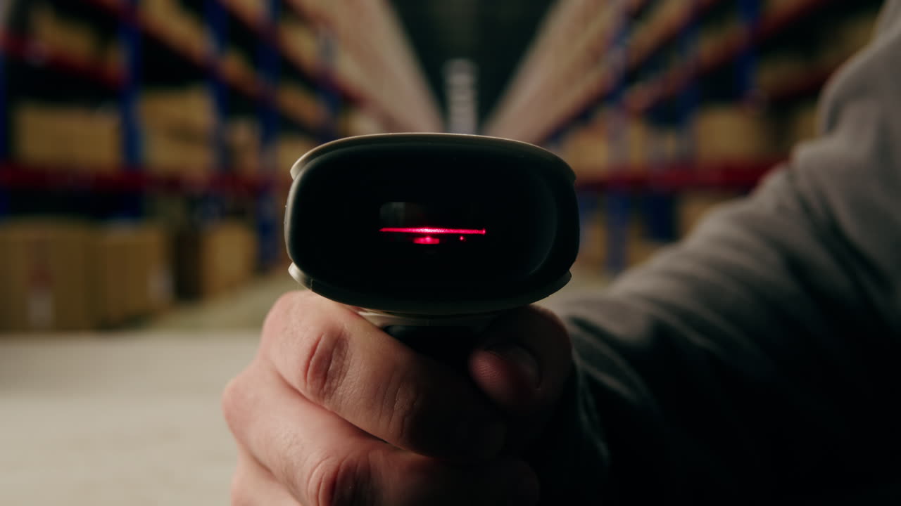 Scanner scan delivery box in storage, E-commerce shop, man packing goods and clothes second hand delivery market, courier Packaging and Shipping Workspace with Supplies and Technology, online sales.