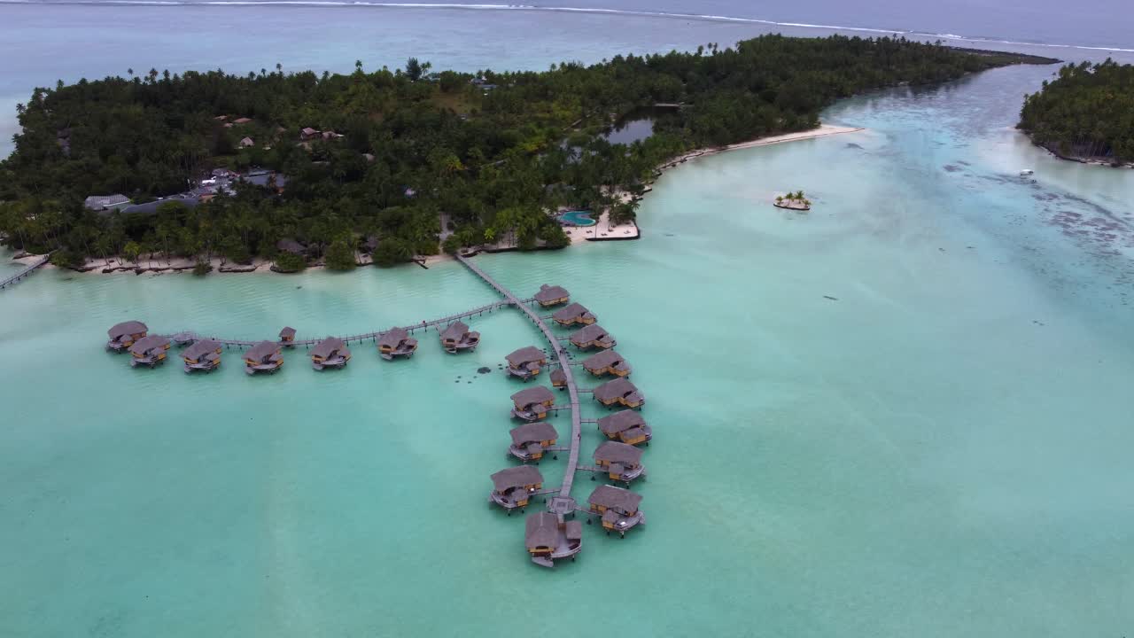 Rotating aerial over Le Taha'a Resort in south Pacific Polynesia Isles