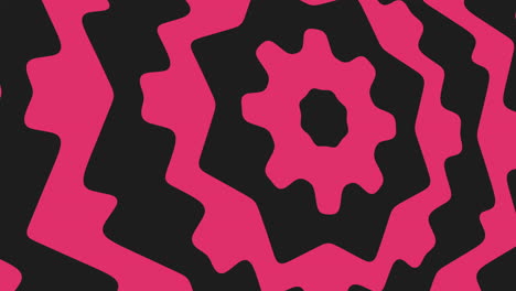 spiraling pink and black pattern of small circles