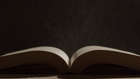 open book with water drops