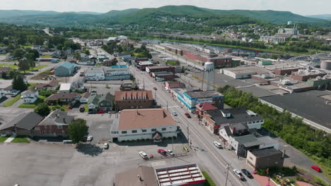 aerial view of downtown madawaska maine with water tower and glimpse of canada