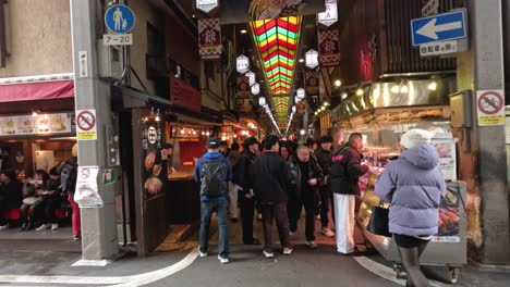 crowded street with diverse pedestrians and vibrant lights