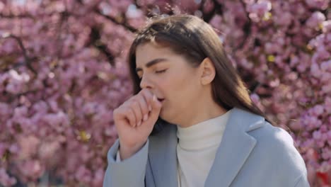 woman enjoying cherry blossoms in spring