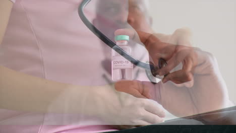 animation of male doctor holding covid 19 vaccine over pregnant woman