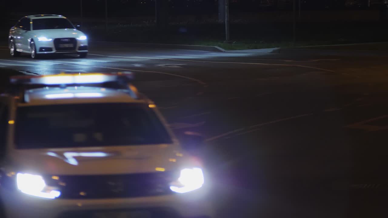 Night traffic on the road and moving cars. Vilnius, Lithuania. 2019-08