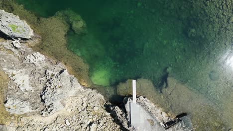 twin rock resort in virac, catanduanes with clear waters and rocky shore, daylight, aerial view